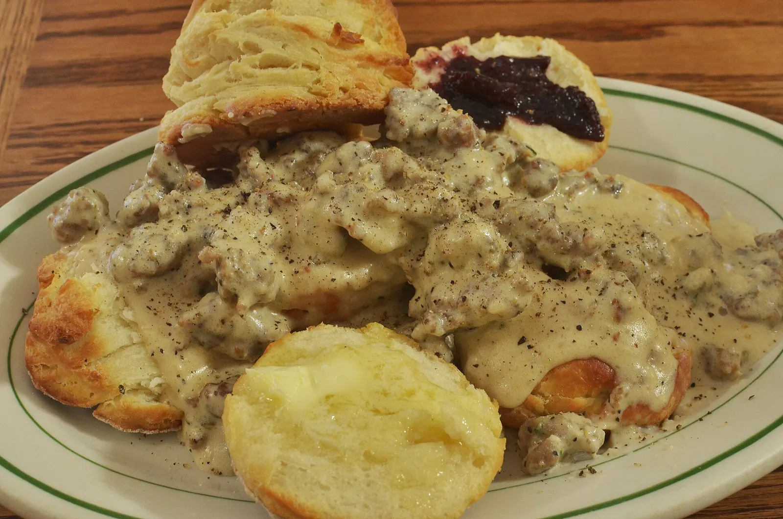 Biscuits and gravy on a plate. The photo was not taken at an Atlanta restaurant.