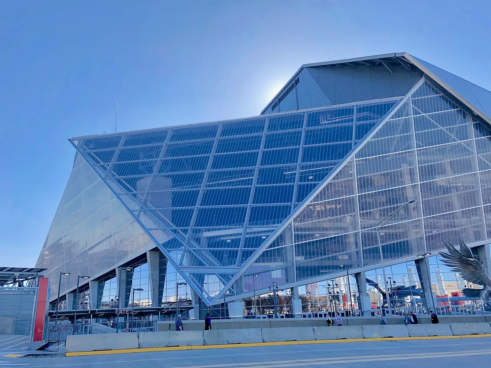 The glass west face of Mercedes-Benz Stadium in downtown Atlanta