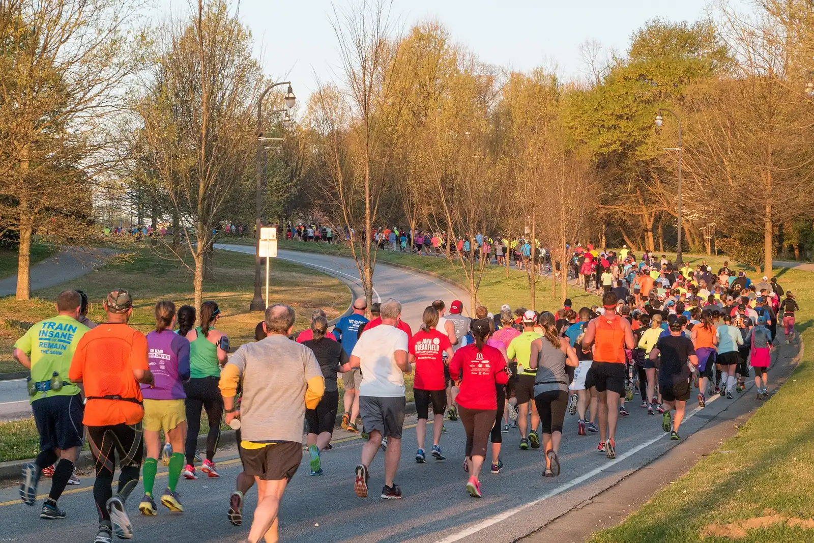 Runners climb Freedom Parkway from Moreland Avenue during a road race in Atlanta.